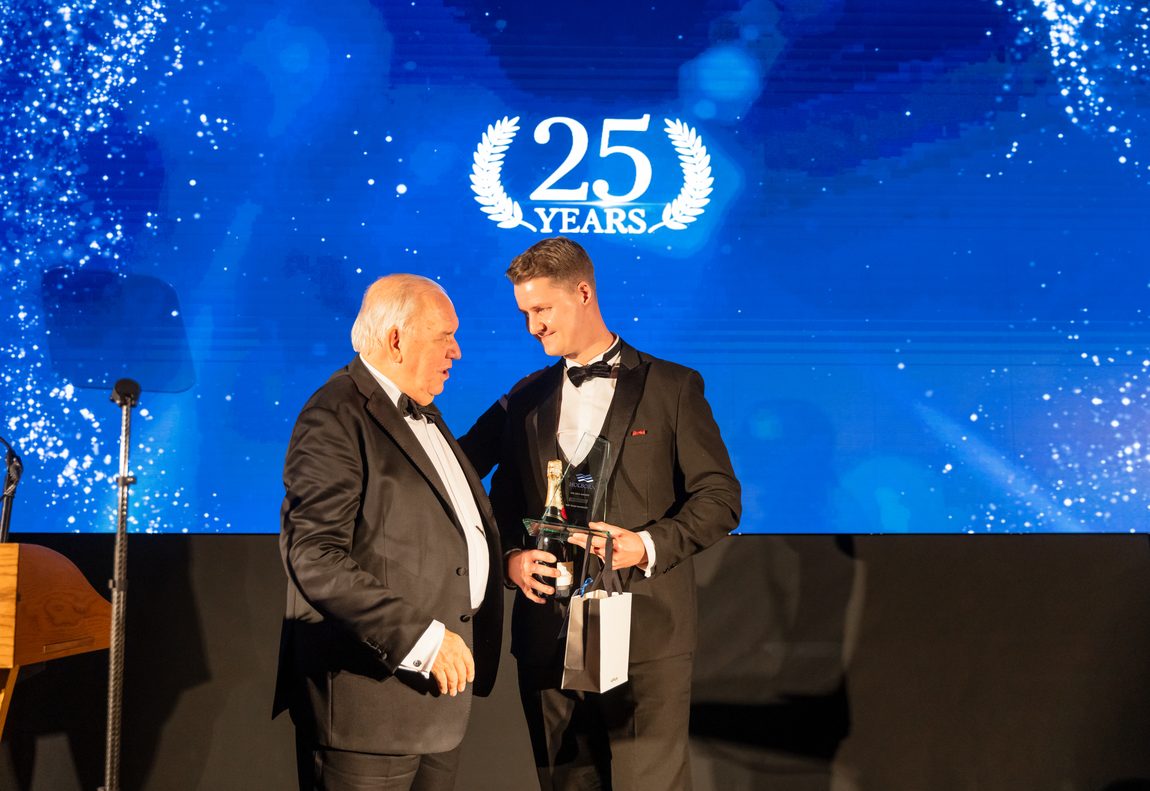 Jason Swan collecting an industry award