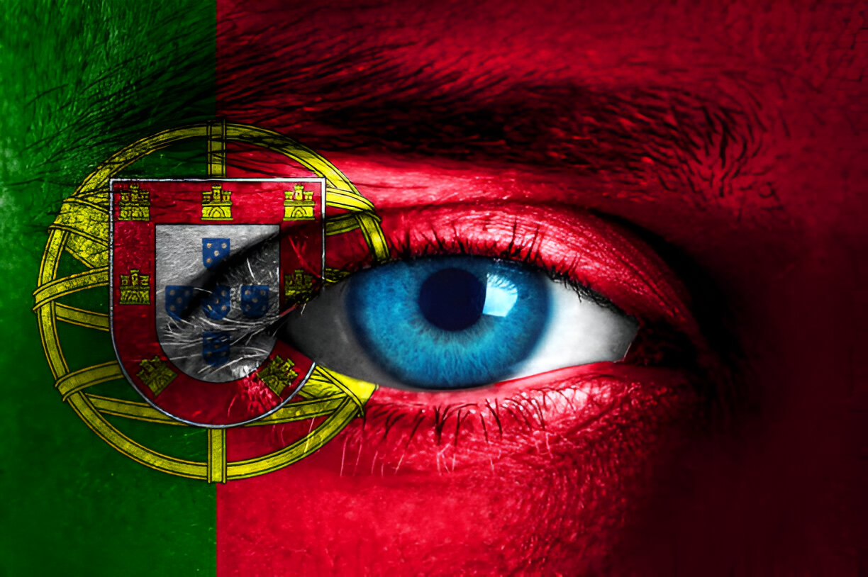 This striking image combines the vivid colors of the Portuguese flag with a close-up of a blue eye, symbolizing a strong connection to Portugal. The artistic overlay of the flag across the eye creates a sense of pride, identity, and focus on Portugal as a central theme. It effectively conveys patriotism, individuality, and a connection to culture.